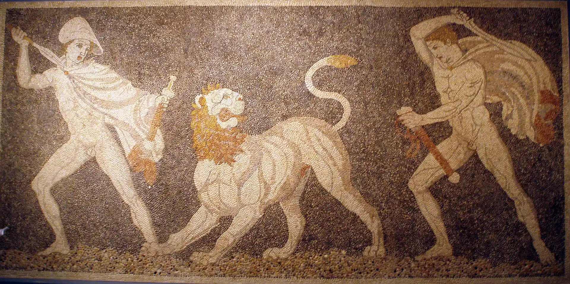 Pebble mosaic from Pella depicting two hunters confronting a lion.